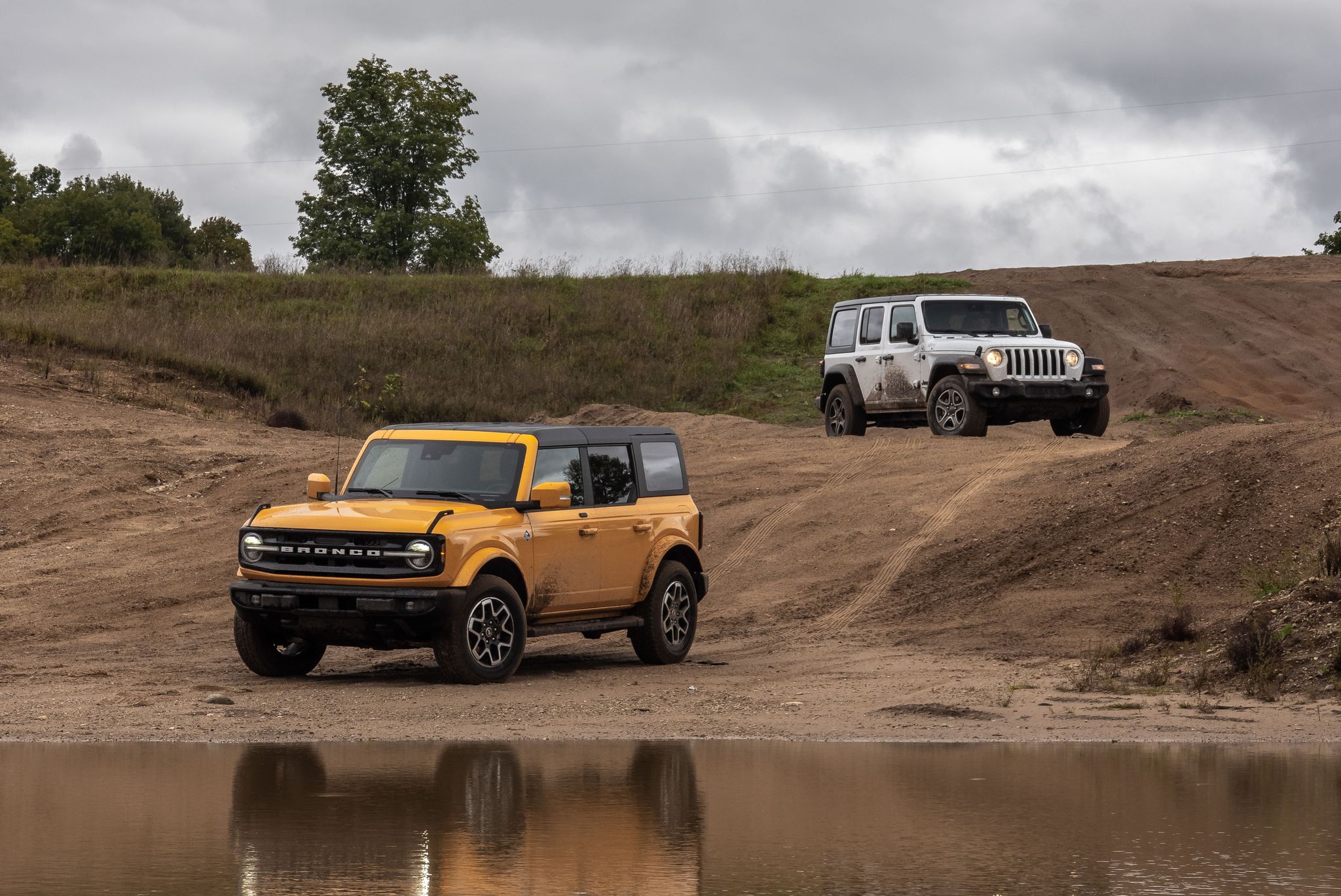 2021 ford bronco outer banks and 2021 jeep wrangler unlimited sport