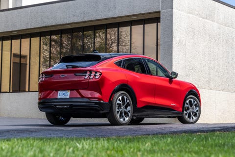 2023 ford mustang mach e parked outside a business