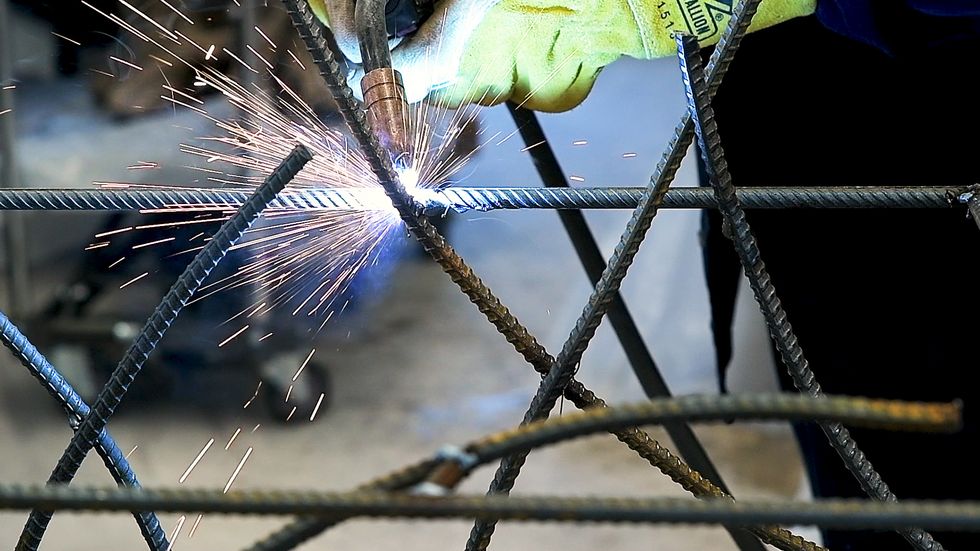 closeup image of a metal structure being welded