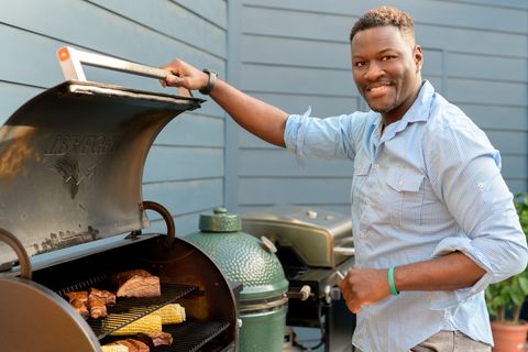 chef darryl bell in front of a barbecue grill