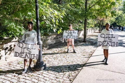 fashion show outside of senator schumer's apartment, brooklyn, ny combined with protest against the dirty pipeline deal