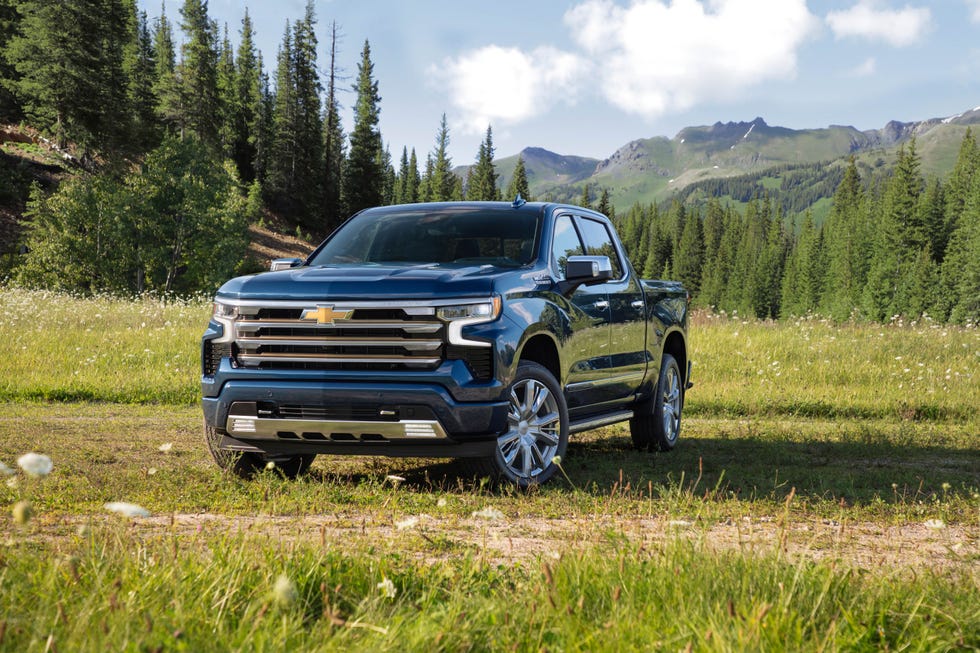 2023 blue chevrolet silverado 1500 high country in a mountain valley