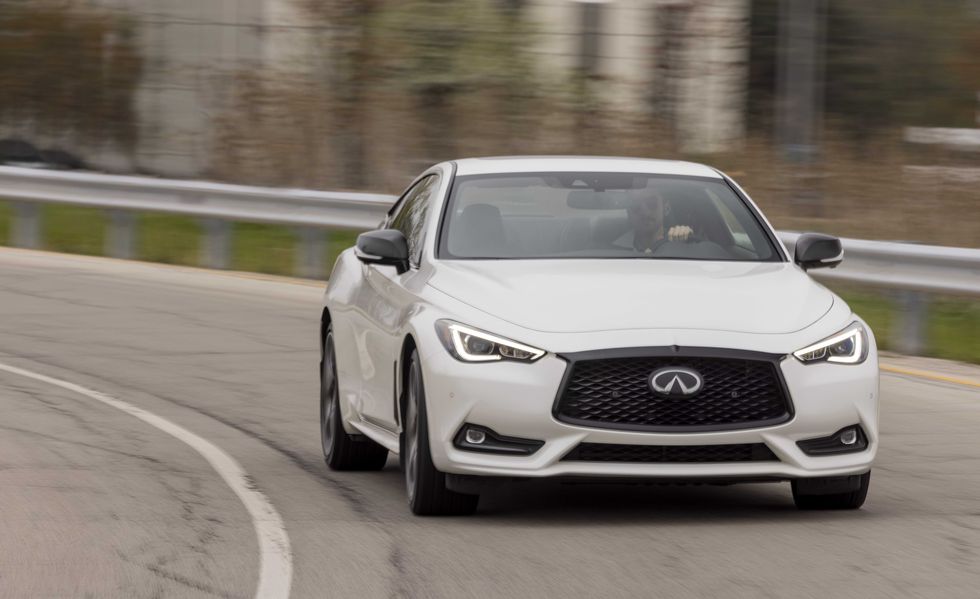 q60 red sport 400 awd shown in majestic white featuring 20 inch accessory alloy wheels