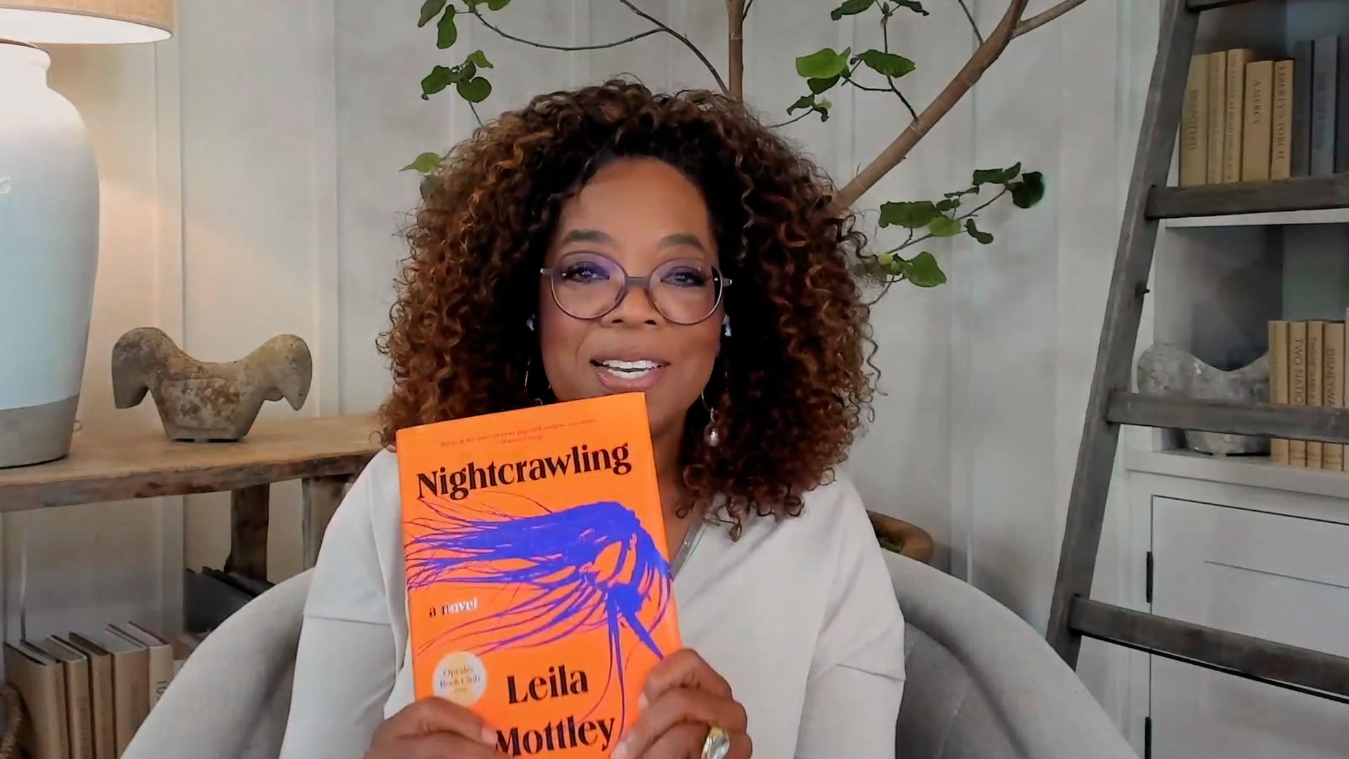 oprah with nightcrawling book
