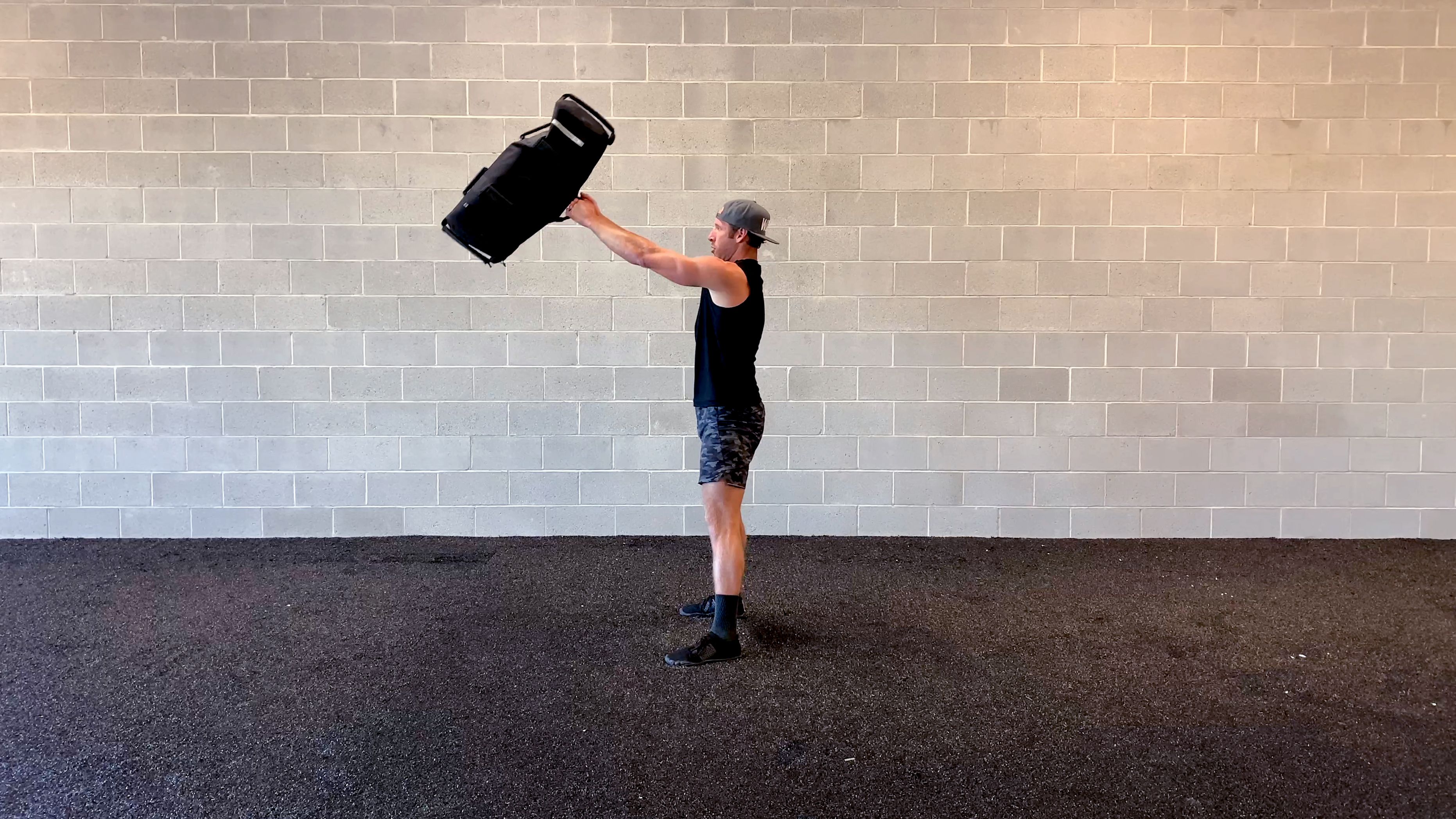 Sandbag Workout to Test Your Coordination and Torch Your Core