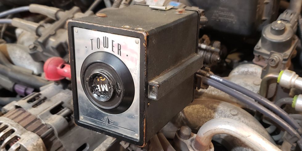 sears tower pinhole camera in junkyard