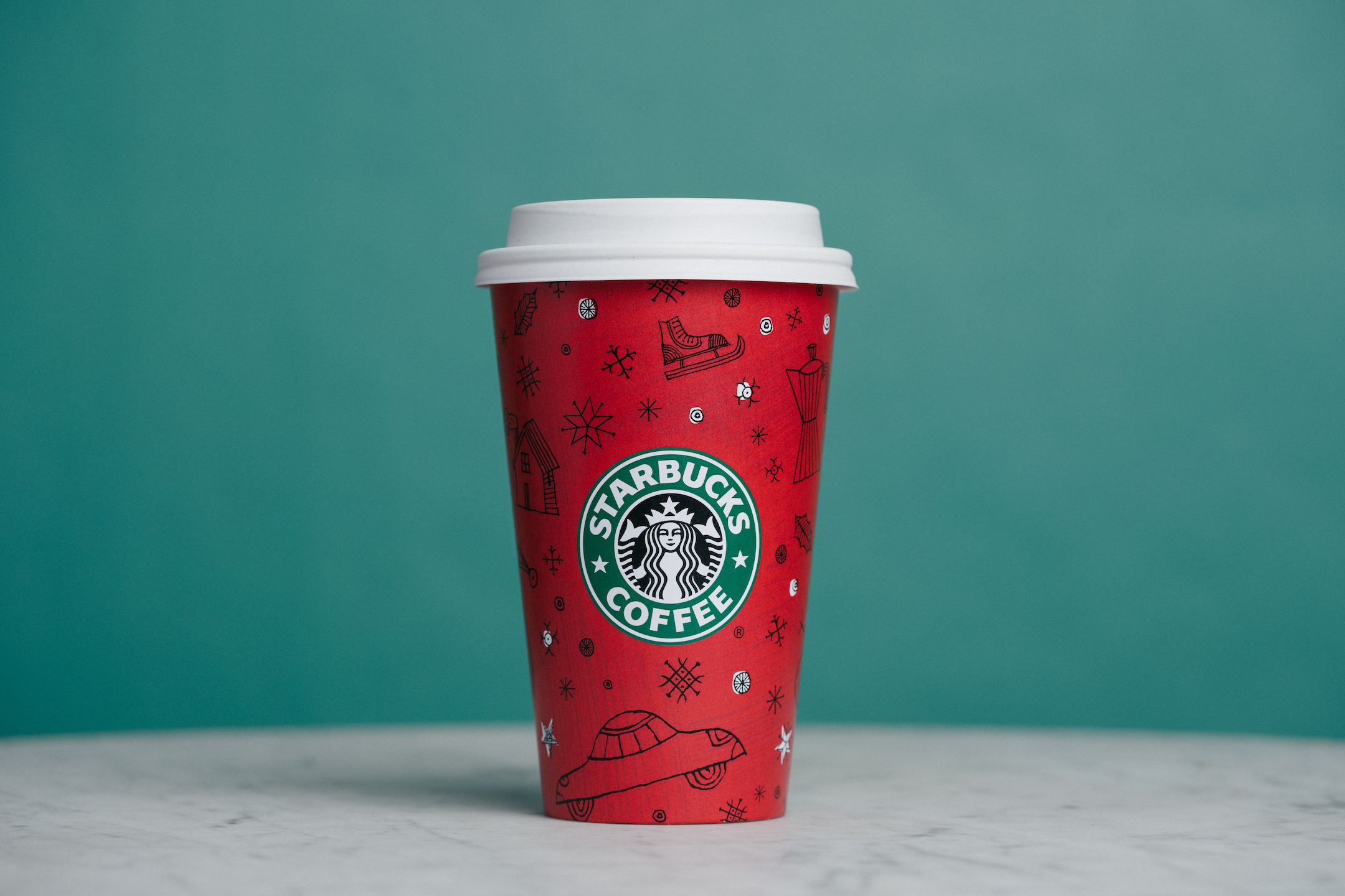Starbucks' Red Cups Feature a Touch of Pink This Year — See the
