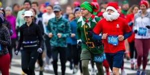 runners in the jingle all the way race dressed in santa costumes