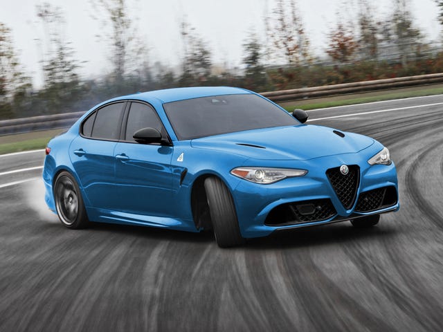 2023 alfa romeo giulia quadrifoglio drifting around a corner