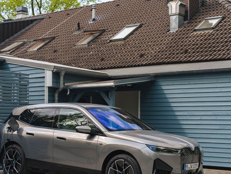 BMW's iX is a flagship electric SUV with 300 miles of range