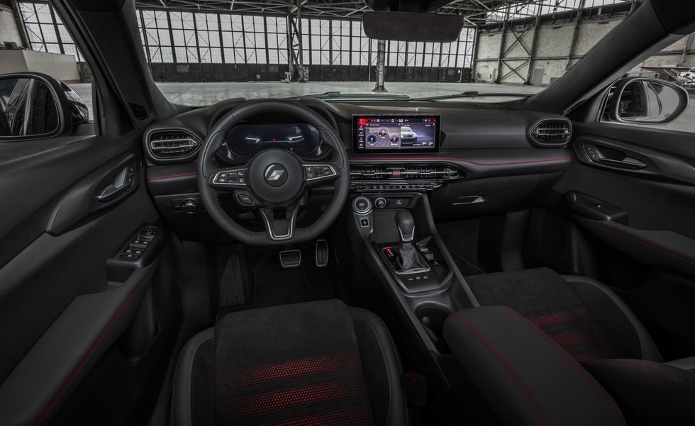 2023 dodge hornet interior with steering wheel, dashboard, and seats