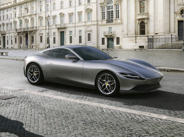 2023 ferrari roma parked near an italian buildling