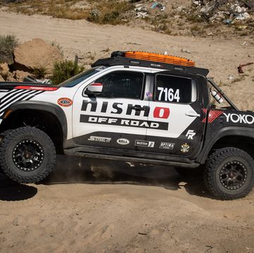 the nissan forsberg frontier off road race truck in the dirt