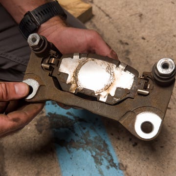 front brake pads being replaced