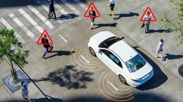 self driving car on street with pedestrians