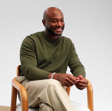 taye diggs sitting in a chair taye diggs sitting in a chair