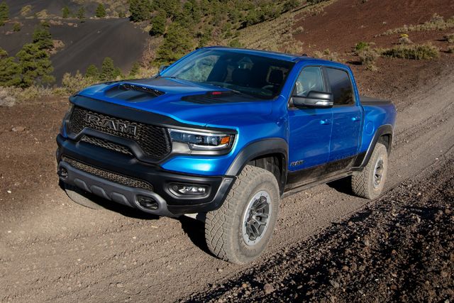 2023 ram 1500 trx off roading over a hill