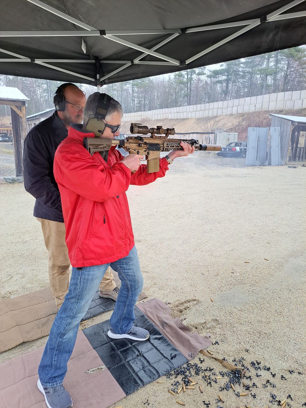 author firing m7 rifle