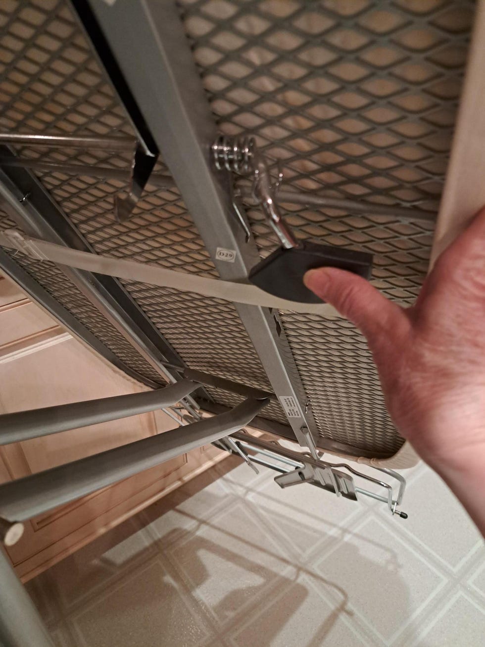 testing the lever on an ironing board