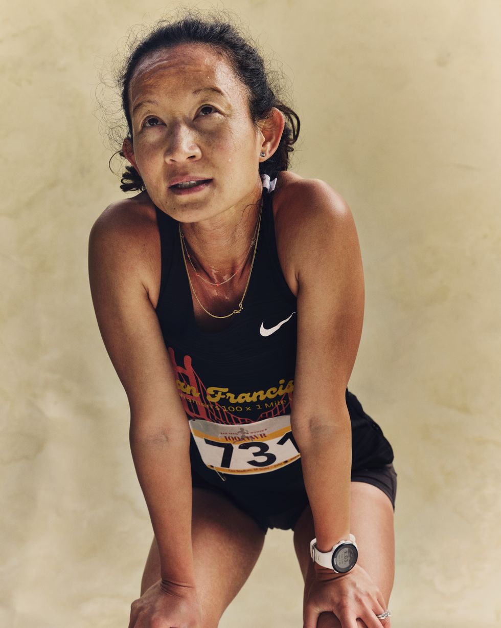 a portrait of a runner against a neutral white background