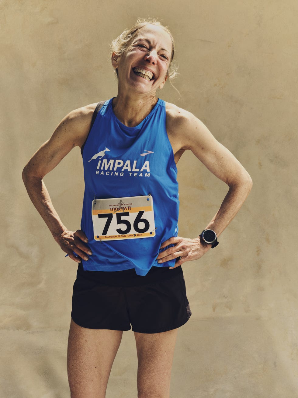 a portrait of a runner against a neutral white background