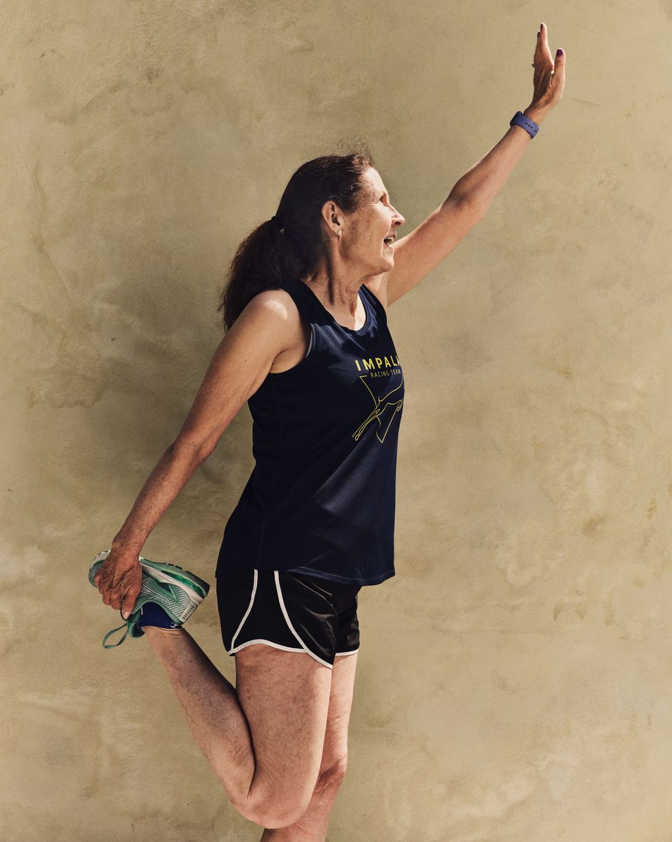 a portrait of a runner against a neutral white background