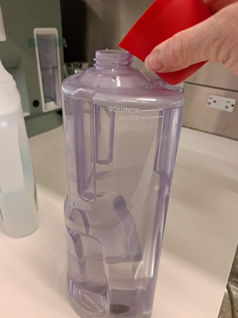 best carpet cleaners filling the carpet cleaner's clean water tank