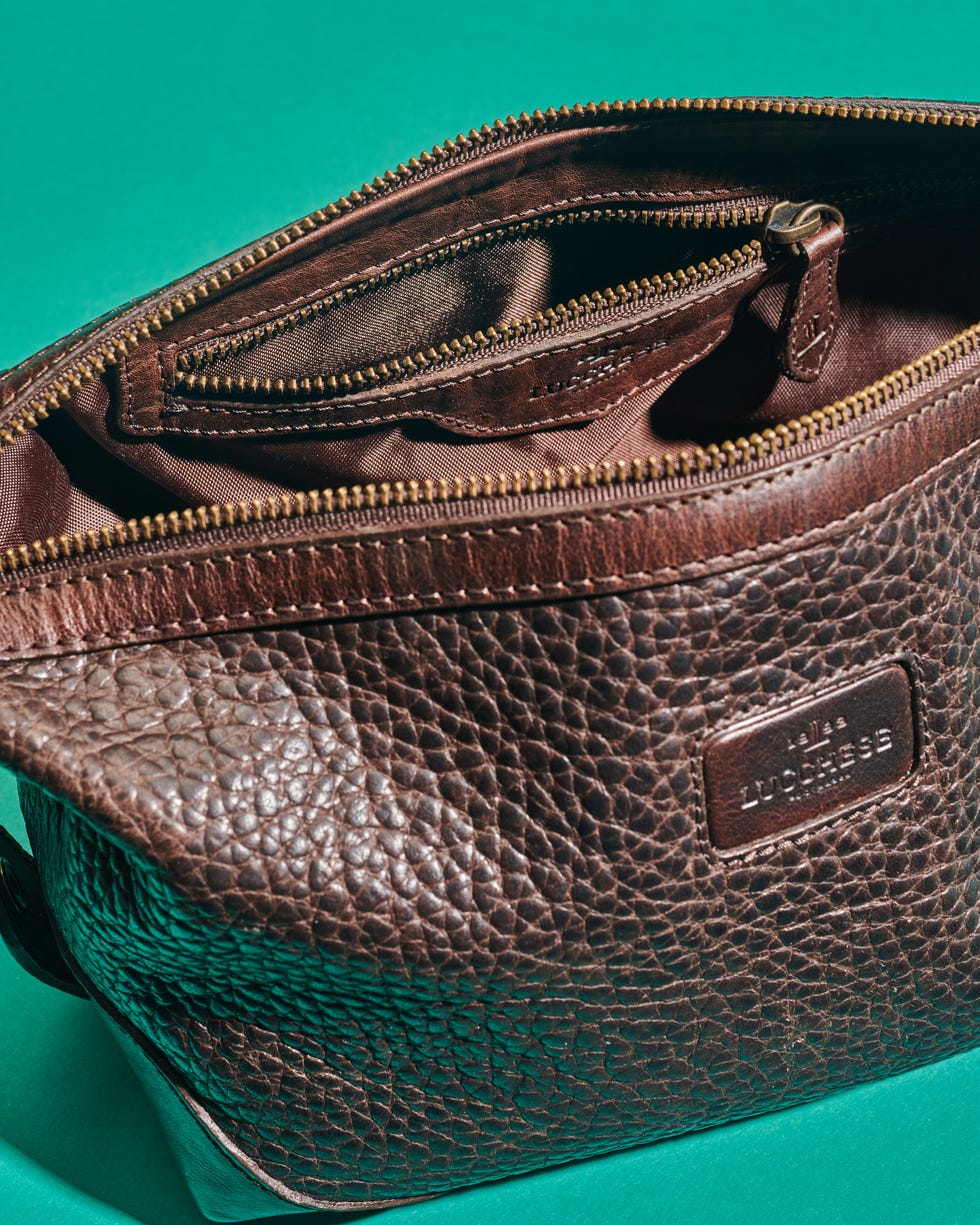 a brown leather purse