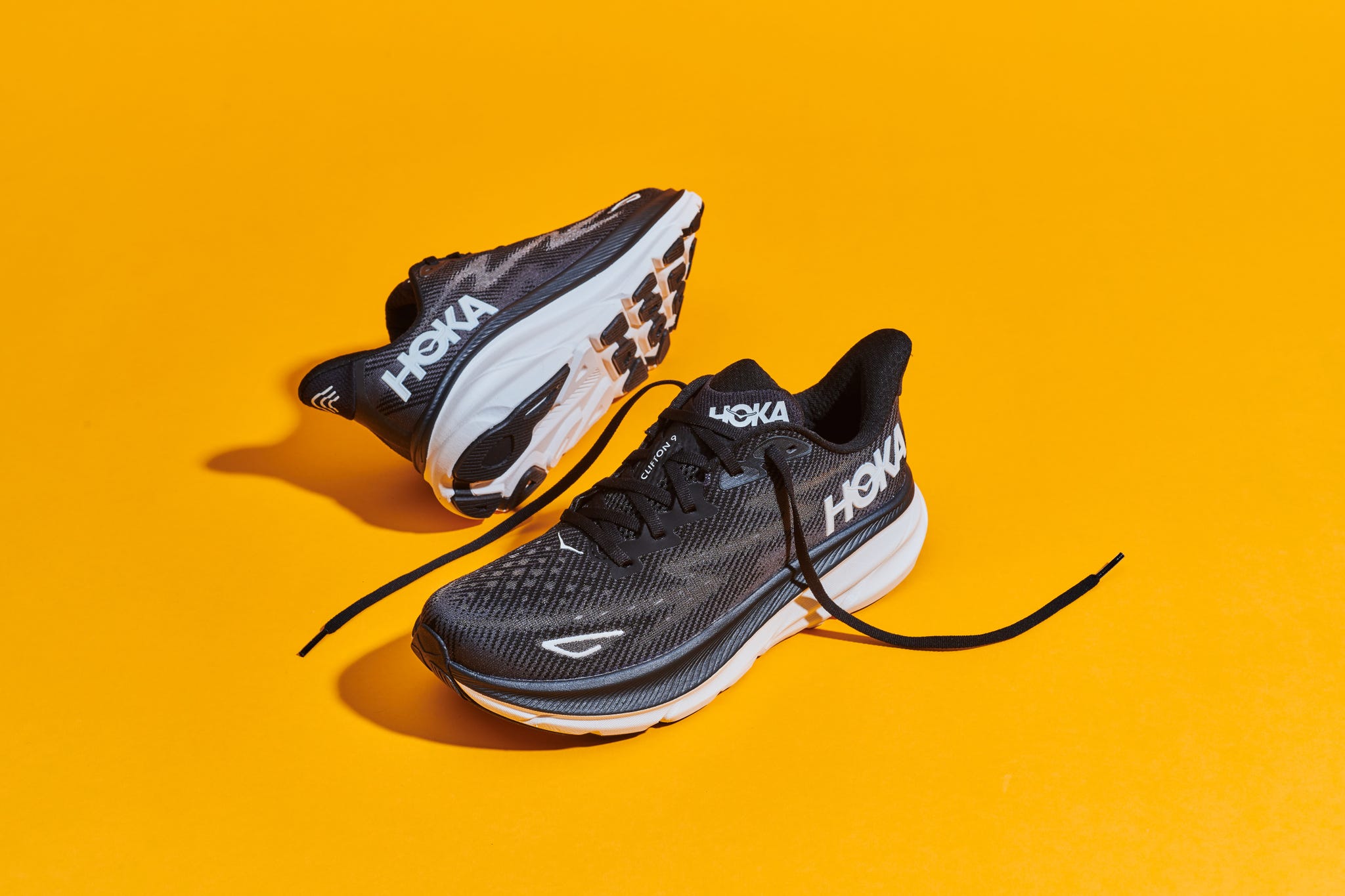 a pair of black and white shoes