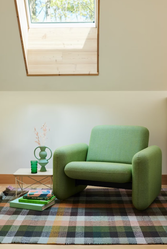 a green chair in a room