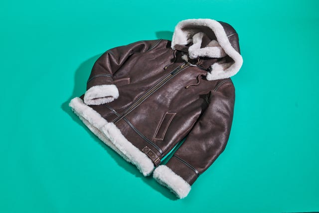 brown leather jacket with a shearling lining and hood