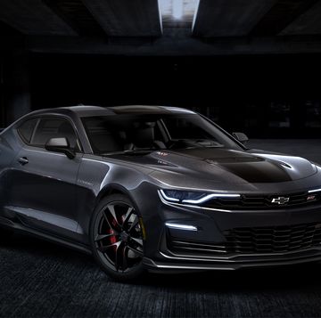 front 34 view of 2024 chevrolet camaro ss collector’s edition in panther black metallic tintcoat preproduction model shown actual production model may vary available late summer 2023