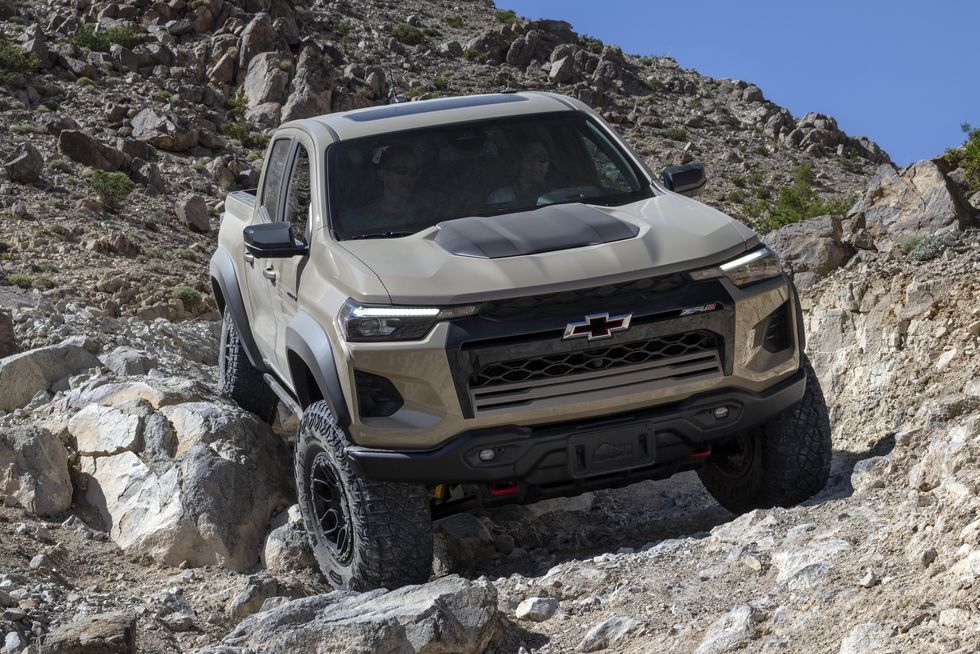 the 2024 colorado zr2 bison rock crawling on an off road trail