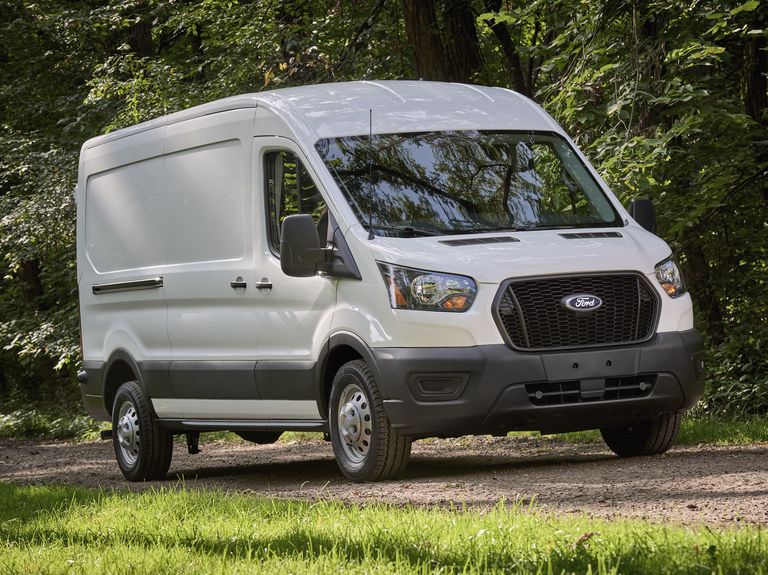 2024 ford transit driving near trees