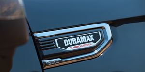 close up of 30l duramax turbo diesel engine badge on the 2024 gmc sierra 1500