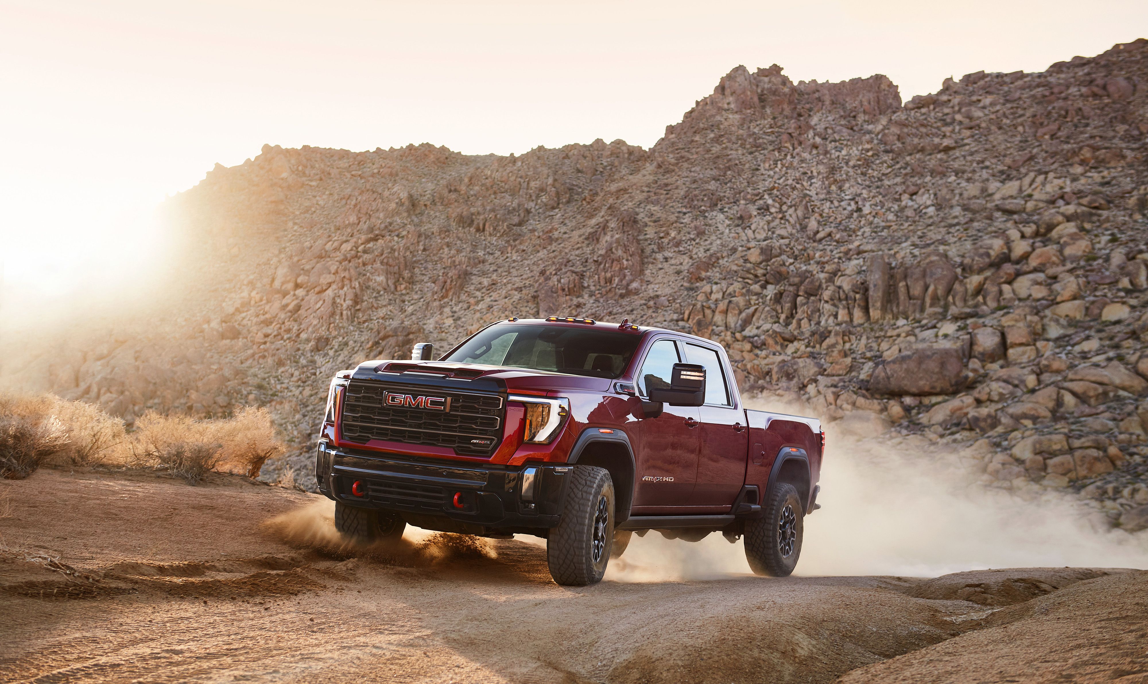 View Photos of the 2024 GMC Sierra 2500HD AT4X and AT4X AEV TrendRadars