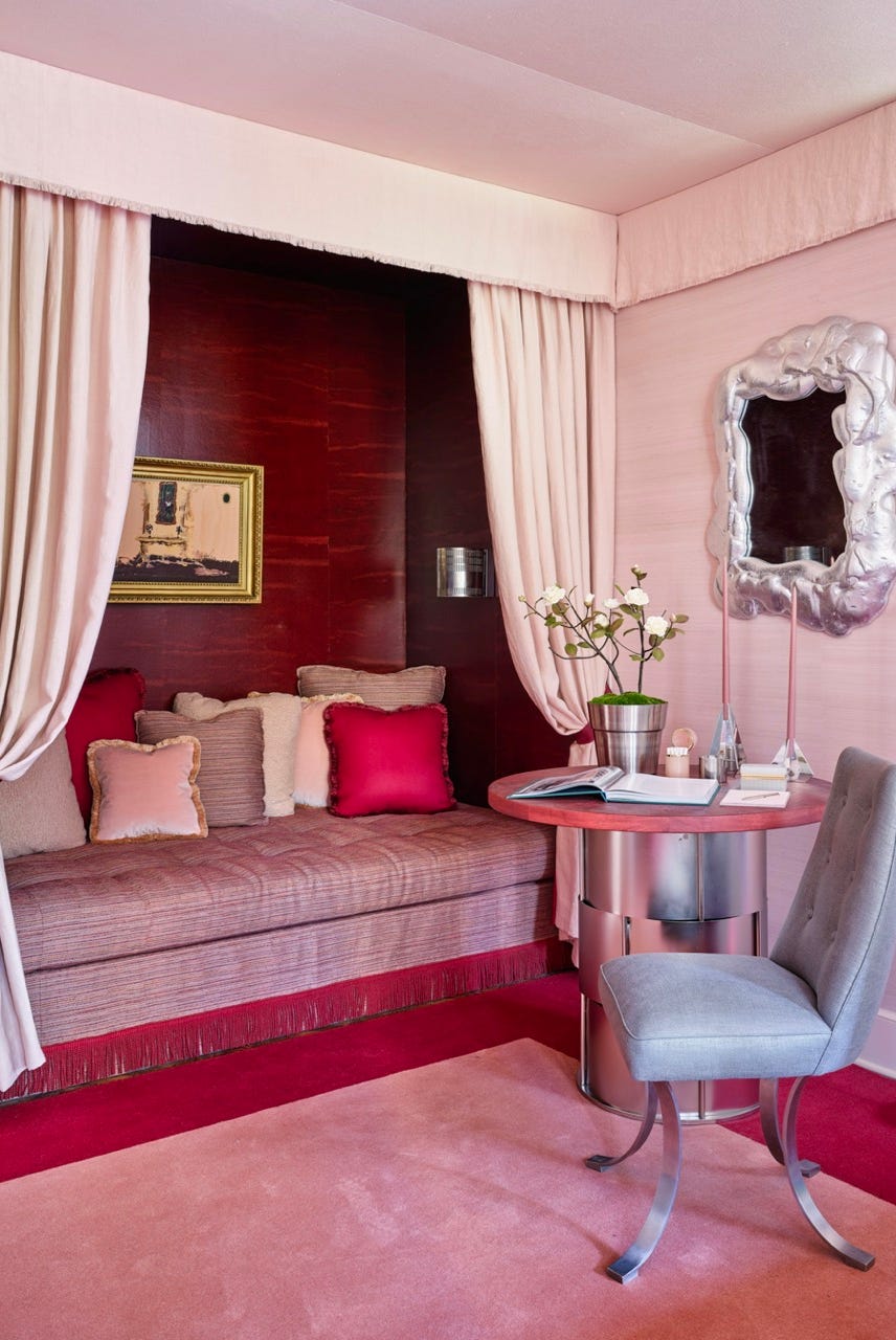 a bedroom with a bed and a chair a bedroom with a bed and a chair
