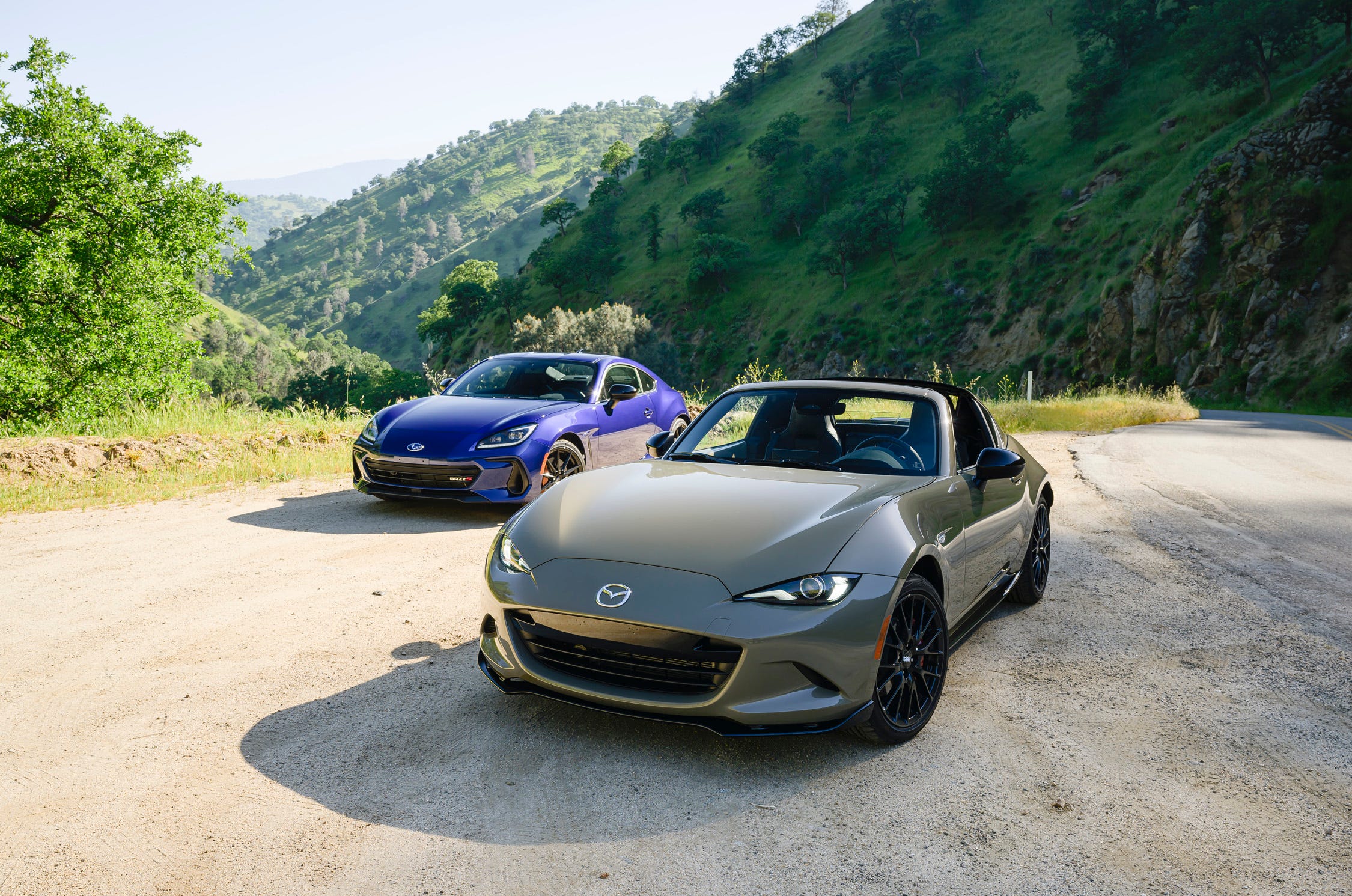 View Photos of the 2024 Mazda MX5 Miata RF Club vs. 2024 Subaru BRZ tS