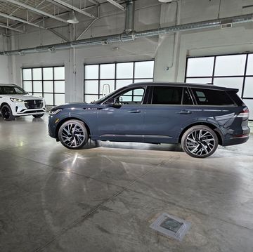 2025 lincoln aviator blue and white parked facing each other
