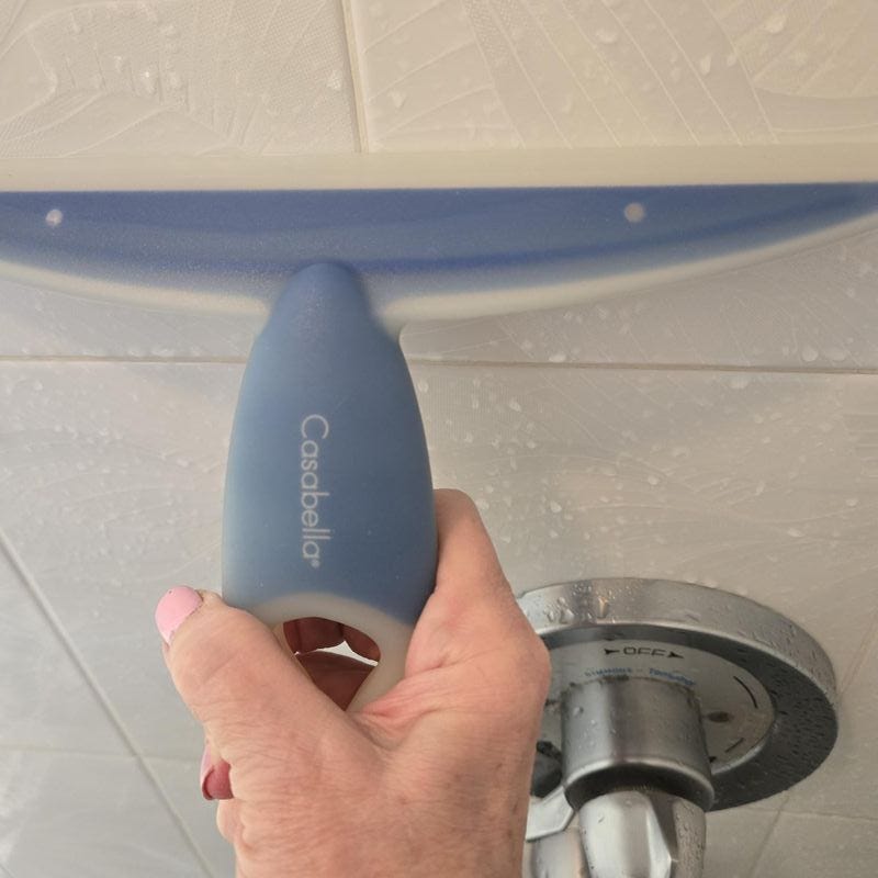 best shower cleaners testing a shower squeegee