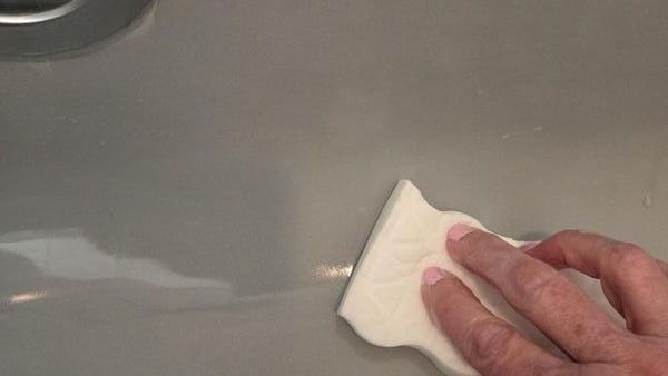 Best Shower Cleaners - Testing a Scrub Pad on a Tub best shower cleaners testing a scrub pad on a tub
