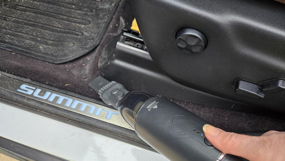 best handheld vacuums testing a vacuum in a car