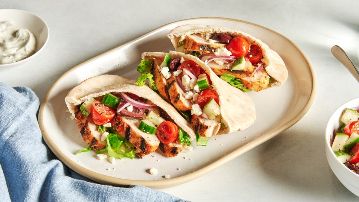 Video player poster image preview for Mediterranean Grilled Chicken Gyros | delish + Aldi