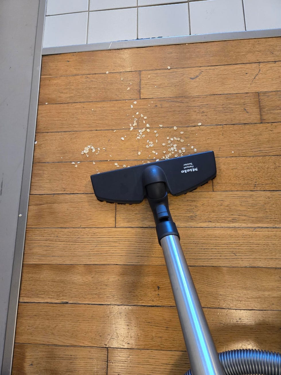 best vacuums for hardwood floors vacuuming debris from a hardwood floor