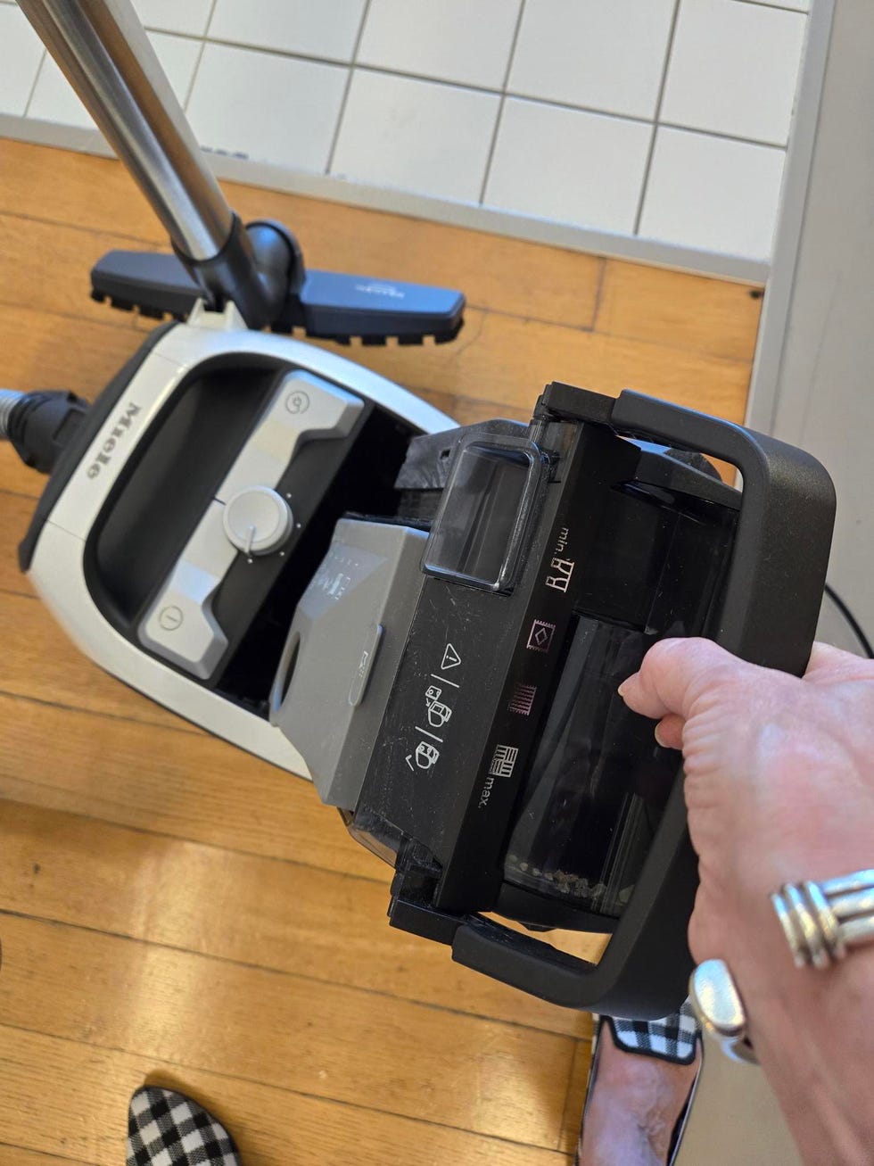 best vacuum cleaners testing a vacuum dust cup