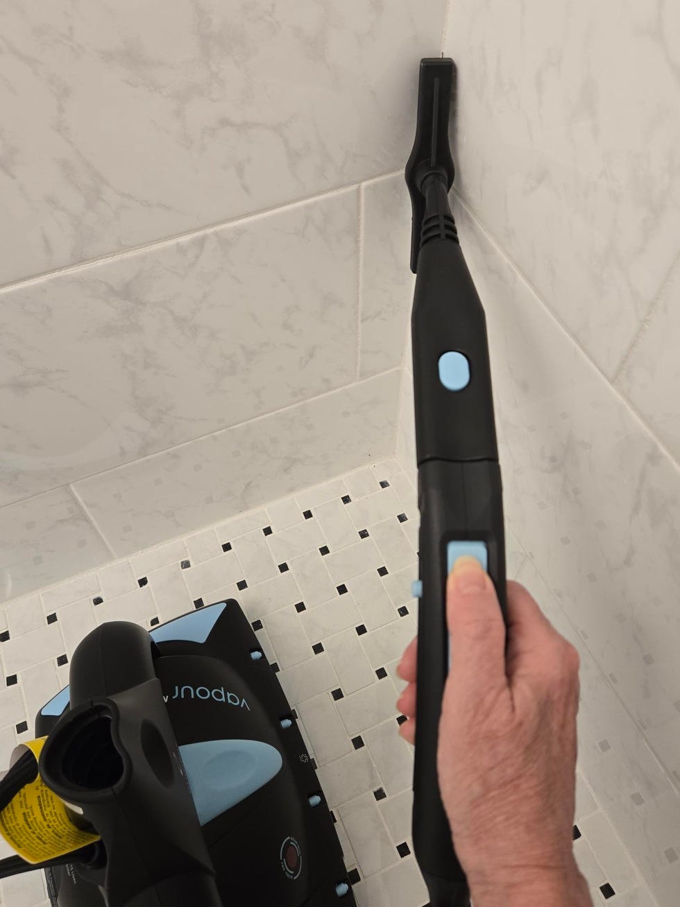 best steam cleaners testing a steam cleaner on bathroom tile
