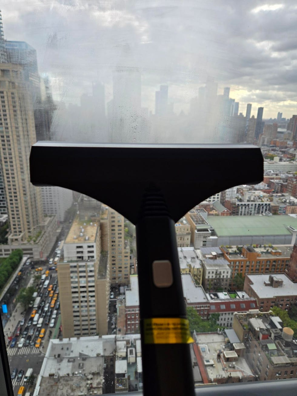 best steam cleaners testing a steam cleaner on a window