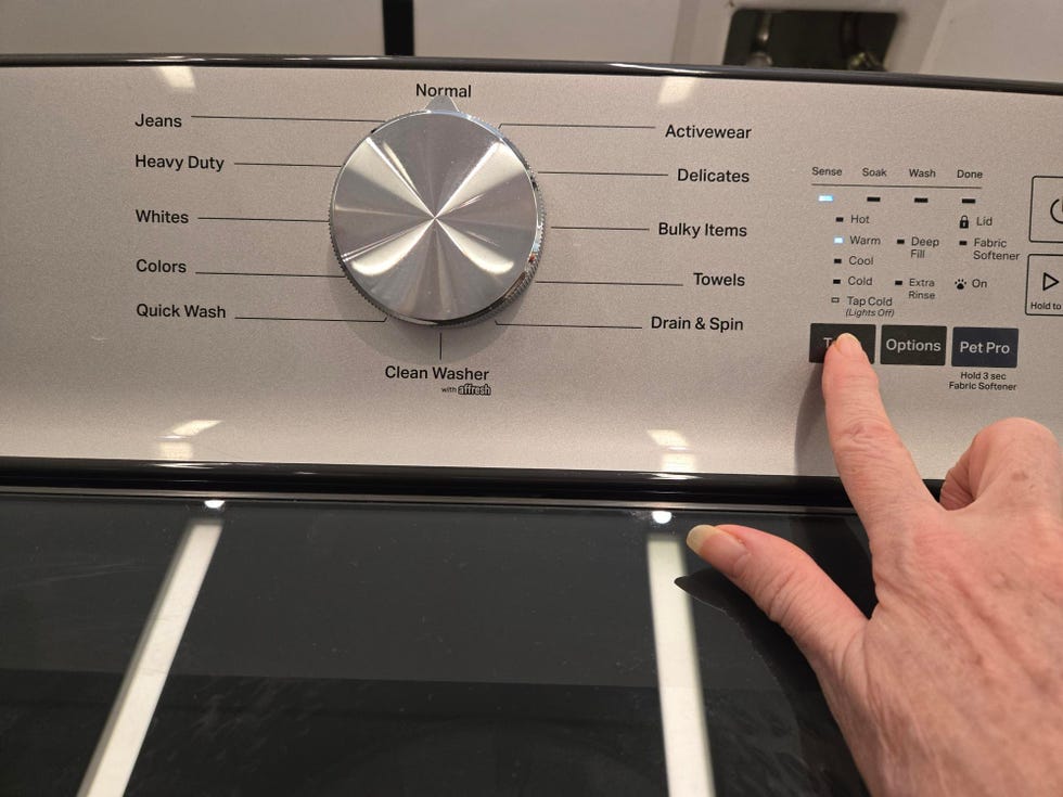 best cheap washing machines testing a washer's control panel