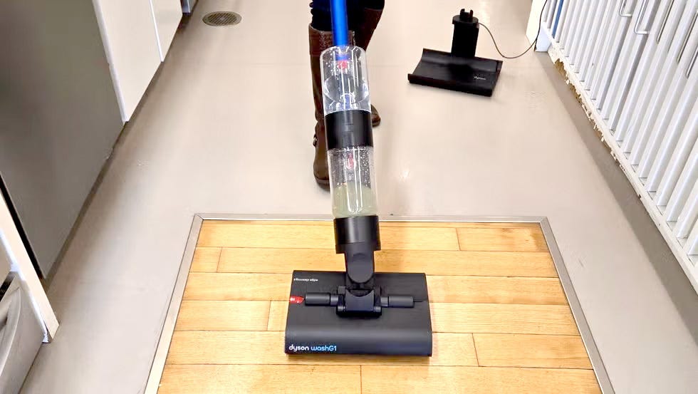 cleaning a wood floor with the dyson washg1 wet floor cleaner