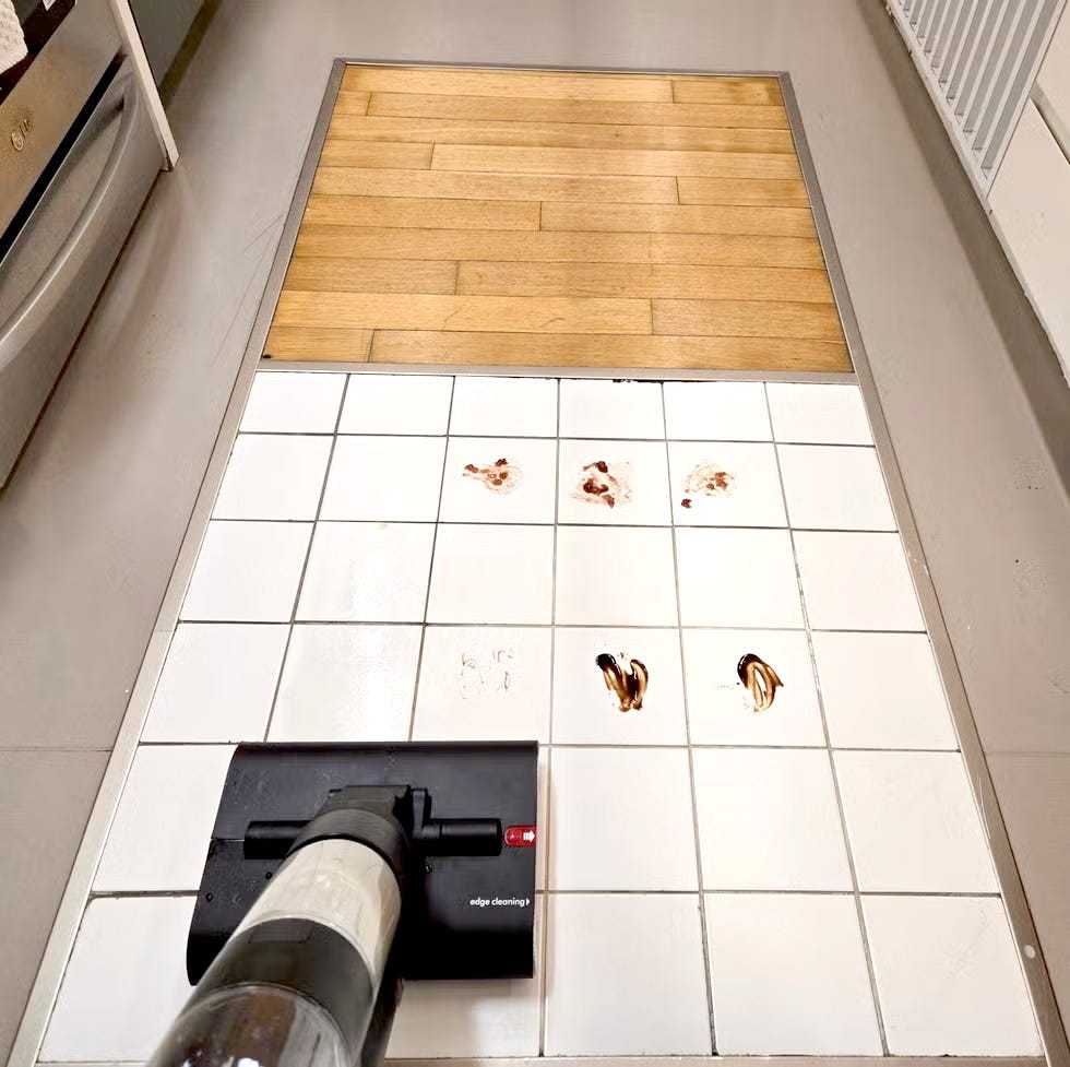 cleaning a stained tiled floor with the dyson washg1 wet floor cleaner